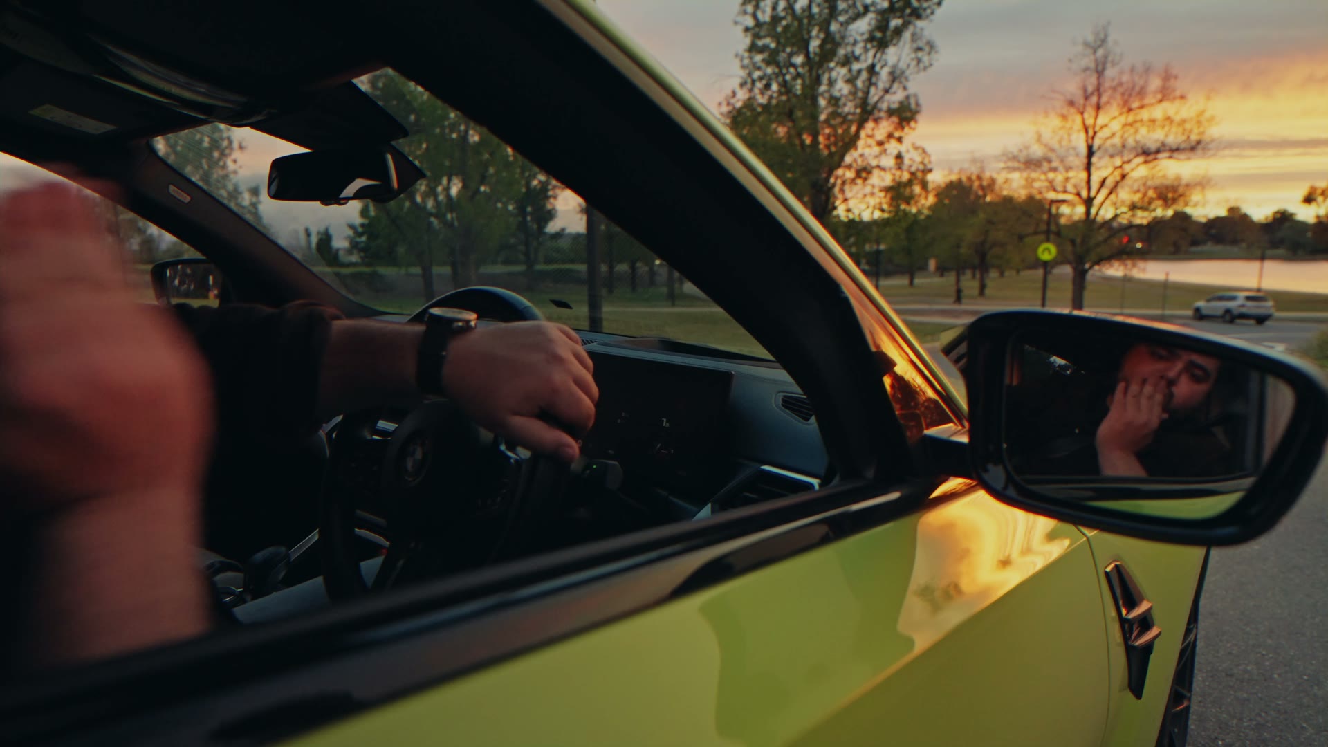 The M3's open door and cream leather seats