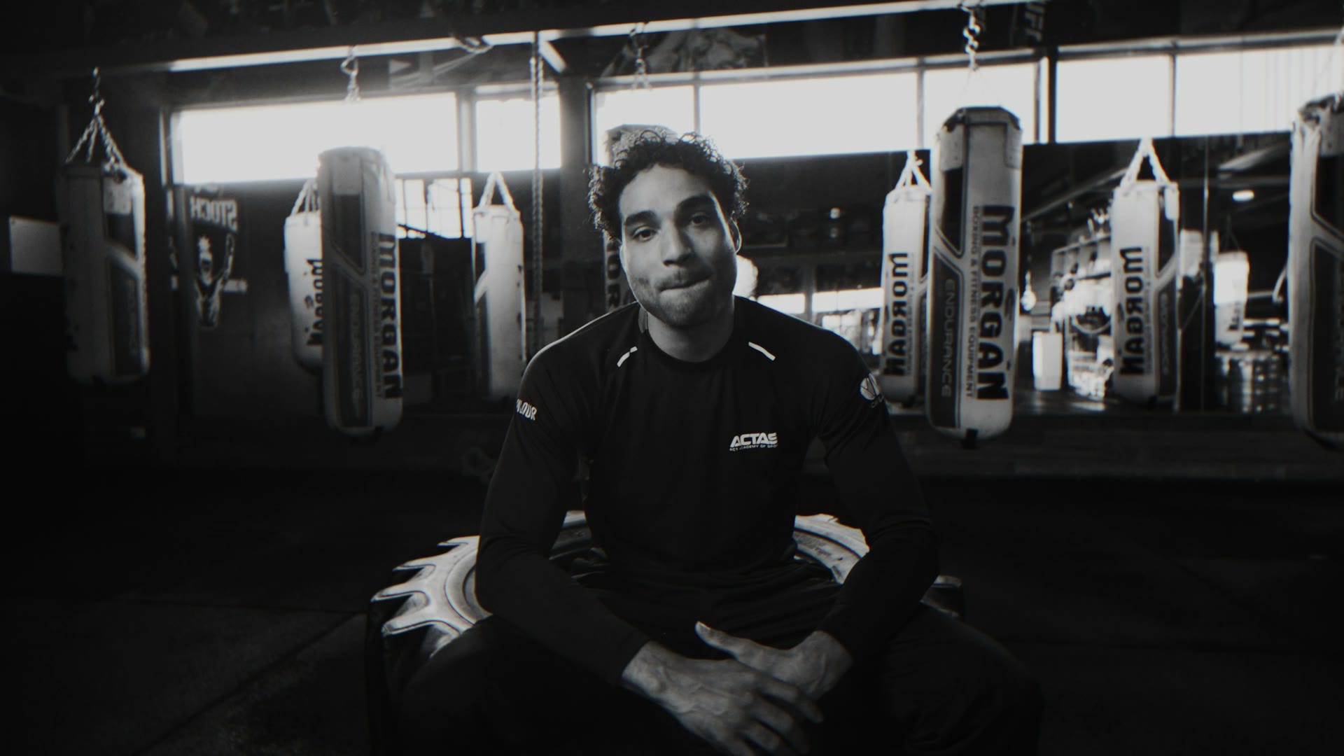 EK talking to camera in black and white